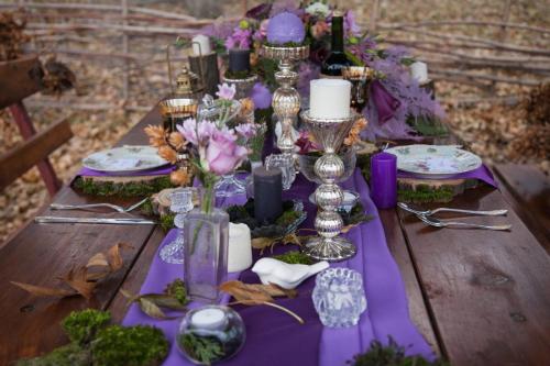 decorated table in the woods
